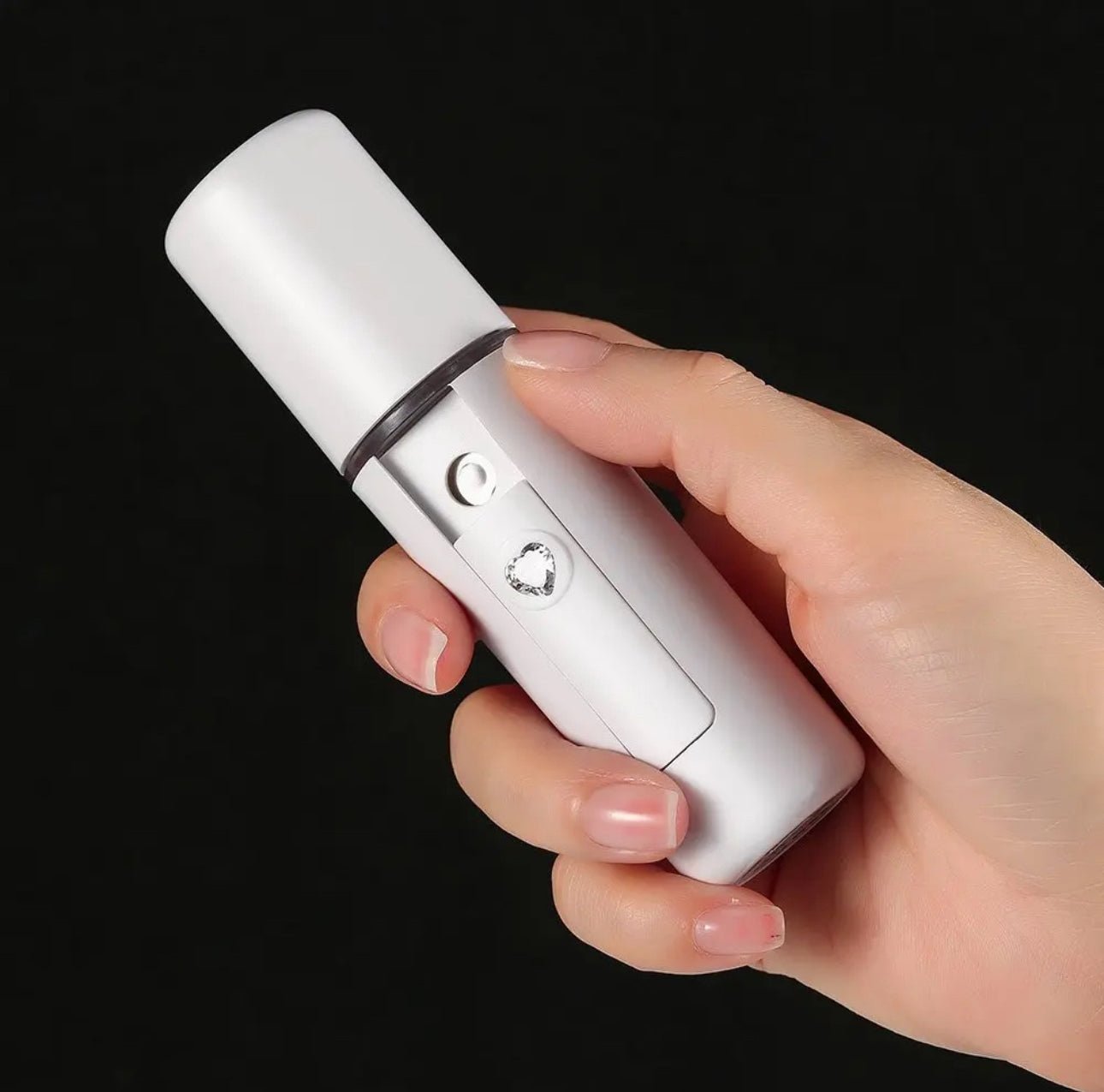 Delicate Daisys Nano Mister handheld facial steamer for deep hydration, enhanced serum absorption, and dewy skin glow lifestyle image