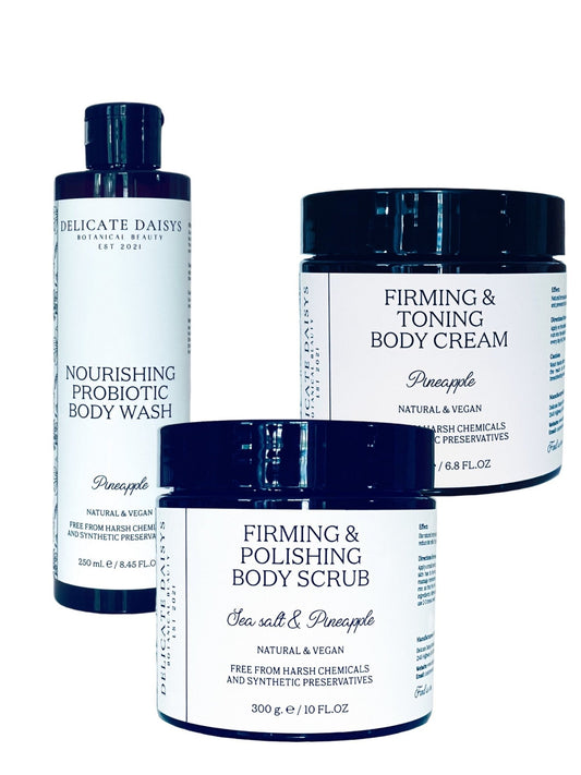 Delicate Daisys Tropical Trio Collection vegan body care set with Probiotic Pineapple Body Wash, Firming Scrub, and Retinol Body Cream